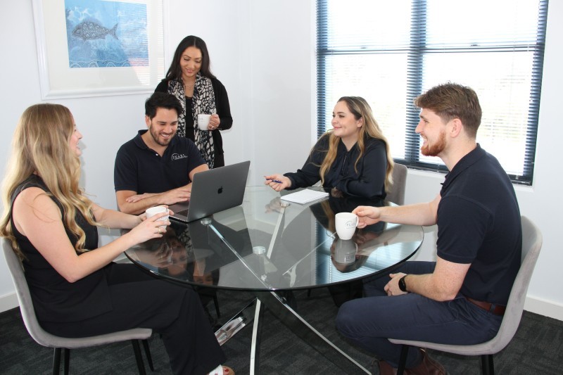 Recruitment team brainstorming during office meeting