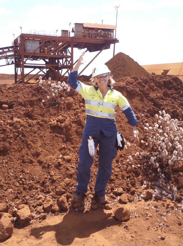 Trade mining woman in safety gear