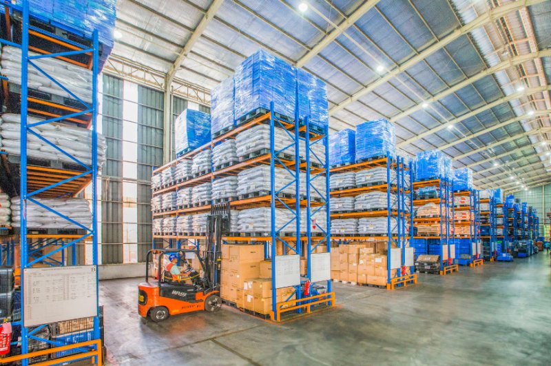 Warehouse with forklift and organized storage