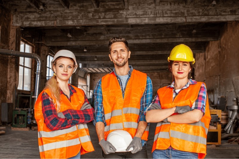 Government recruitment team in construction site